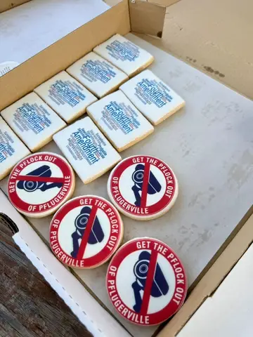 Decorated cookies reading Get the Pflock Out of Pflugerville and Fourth Amendment at the Goodbye Flock party