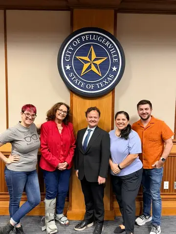 Jonathan Coffman with supporters after being sworn in