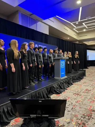 Students performing during a Pflugerville State of the City program