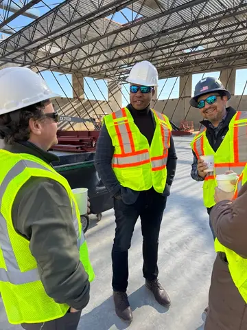 Jonathan Coffman speaking with local leaders during The Monarch construction site visit