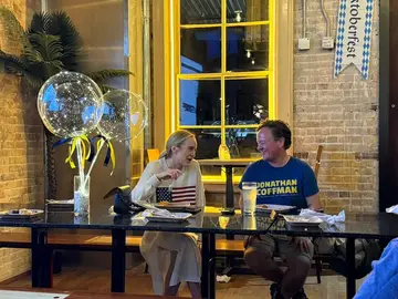Jonathan Coffman speaking with residents at Deutschen Pfest