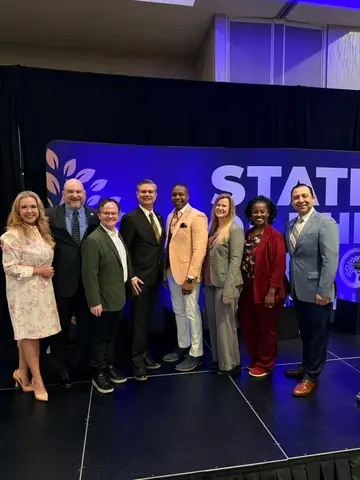 Jonathan Coffman with Pflugerville leaders at State of the City