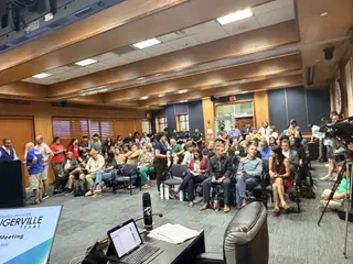 Residents filling the Pflugerville City Council chamber before the unanimous vote to end the City's Flock Safety contract