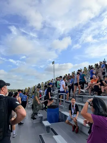 Residents and first responders filling the stadium stairs during the September 11 memorial climb
