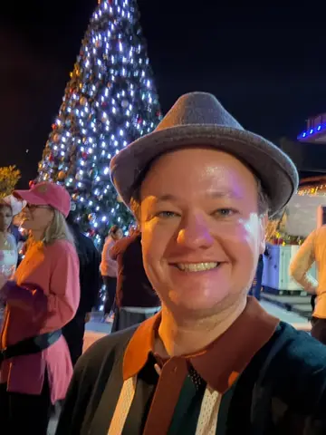 Jonathan Coffman taking a selfie at a holiday stroll event