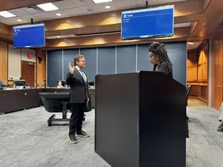 Jonathan Coffman taking the oath of office for Pflugerville City Council Place 1