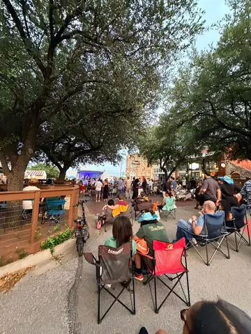 Residents gathered for an outdoor downtown Pflugerville event