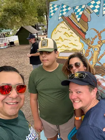 Jonathan Coffman taking a selfie with residents at Deutschen Pfest