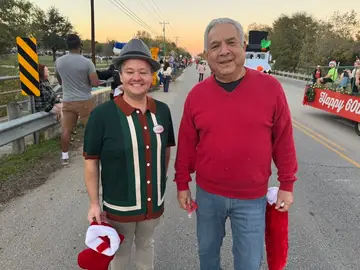 Jonathan Coffman with Mayor Victor Gonzales during a Pflugerville holiday parade